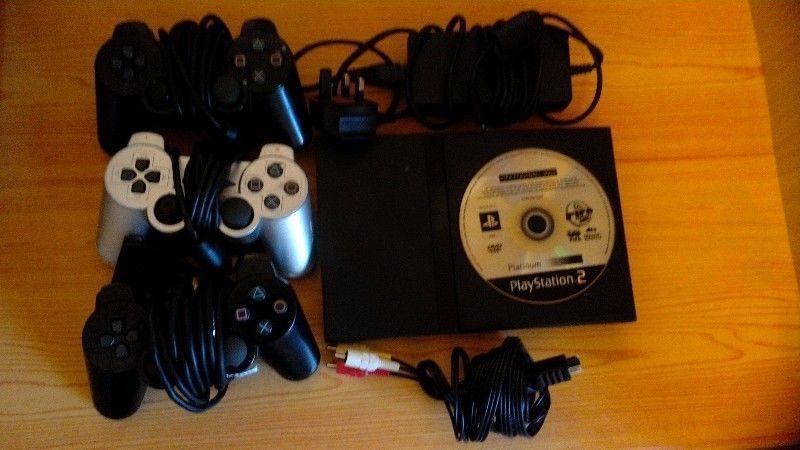 PS2 w/ 3 Controllers-all cables and free game