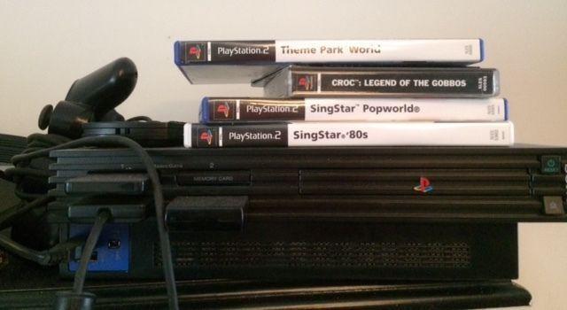 Playstation 2 with some games