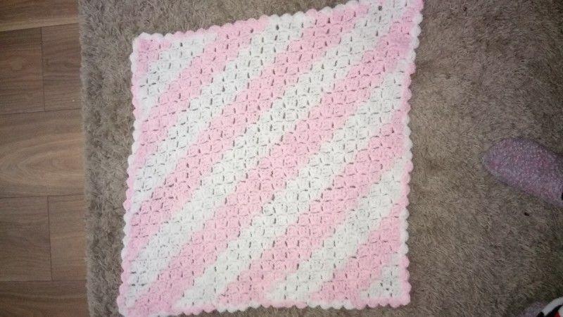 Babies hand knitted blankets and cardigan