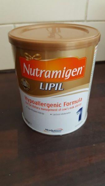 Tins of Nutramigen 1 formula