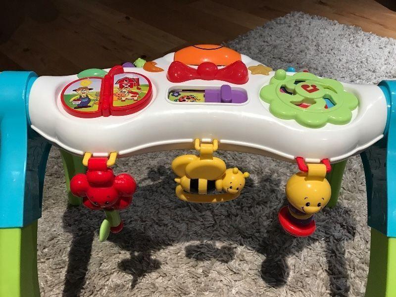 Almost new baby standing musical toy