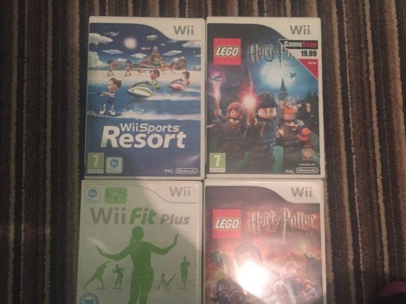 Nintendo Wii with balance board and games