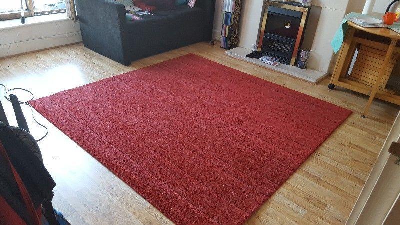 Red rug living room