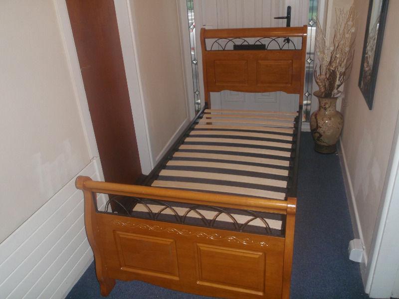 lovely solid single bed, curved ends