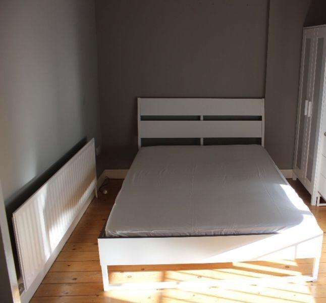 Double bed with metal frame