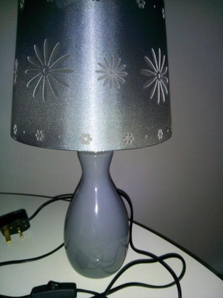 Grey table lamp with click on off button