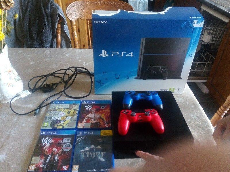 Playstation 4 500GB with 4 games and 2 controllers