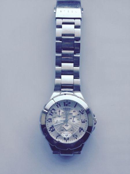 GUESS UNISEX FORMAL/DRESS WATCH- Silver / Stainless steel. Multi-functions. 5 atm (50 metres depth)