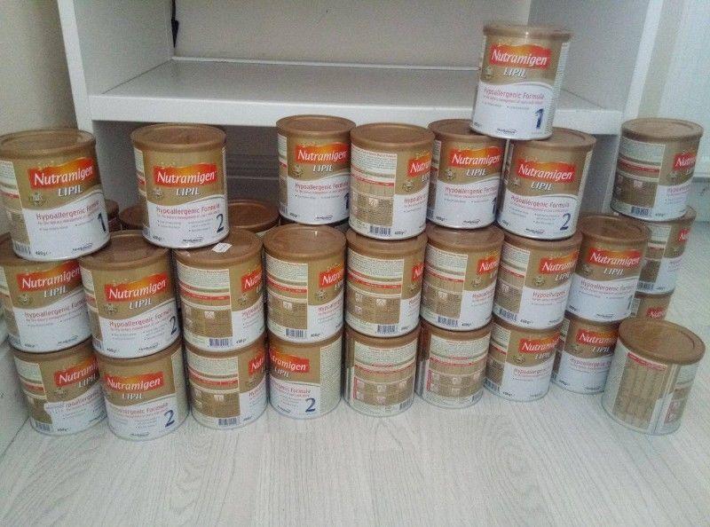 42 tins of Nutramigen LIPIL baby food number one and two