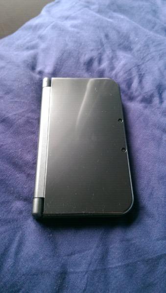 Nintendo 3DS XL - metallic black + Pokemon X