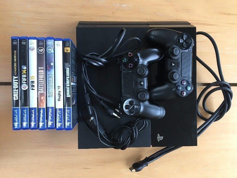 PS4 (Playstation 4) with 2 controls and 7 games, Almost NEW