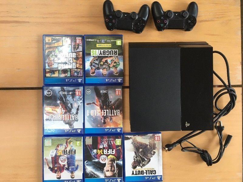 PS4 (Playstation 4) with 2 controls and 7 games, Almost NEW
