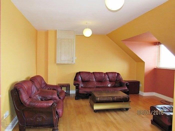 Leather sofa and two armchairs