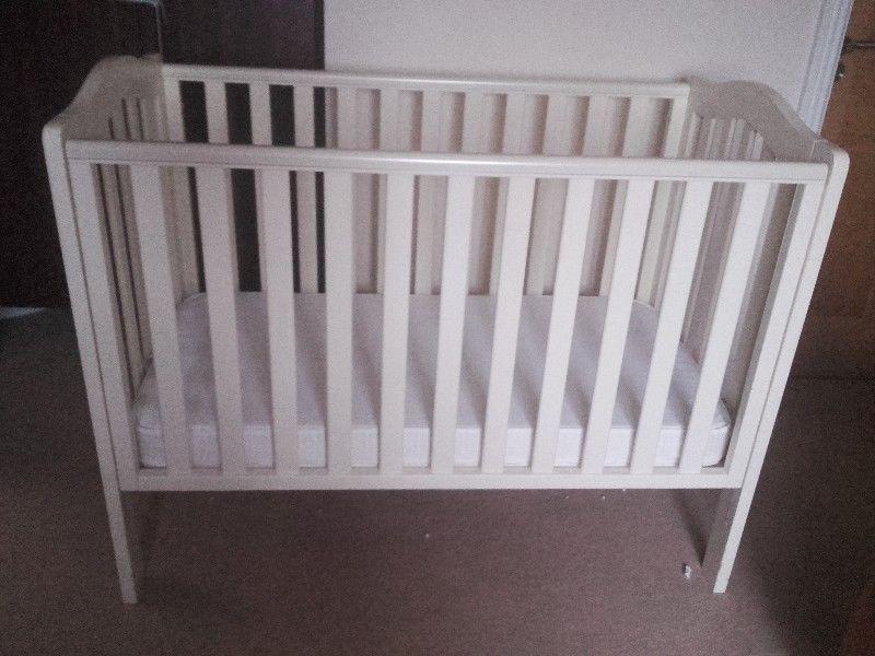 Cream wooden cot