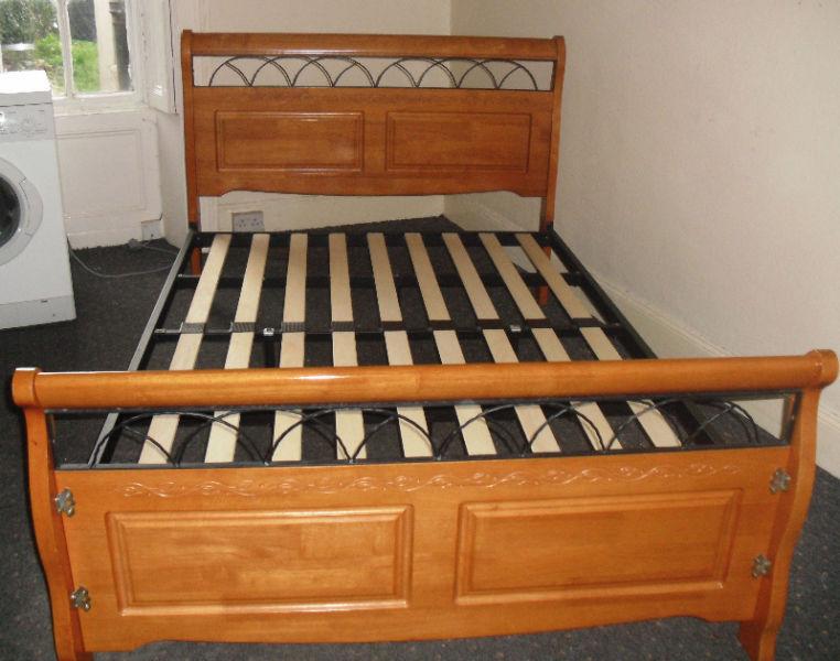 Sleigh bed frame