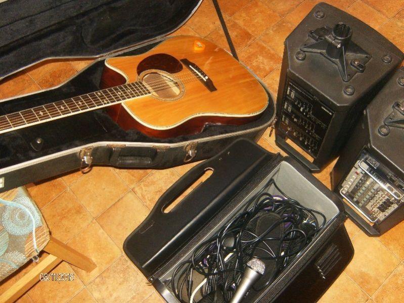 music equipment including stands tripods cables guitar in hard case