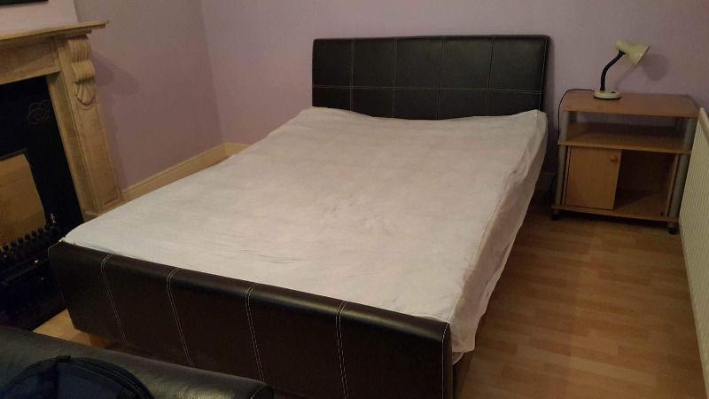 Double bed with Leather headboard for Sale