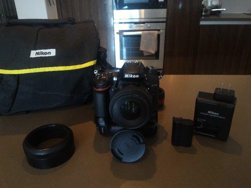 Nikon D7100 with grip and Sigma 30mm 1.4 Art lens