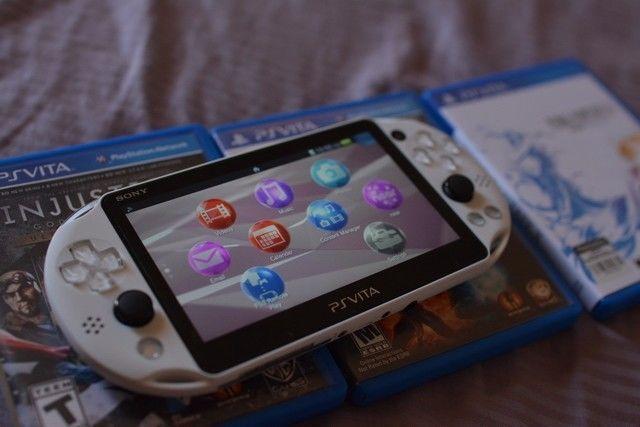 Sony Playstation Vita Slim Portable with 3 games