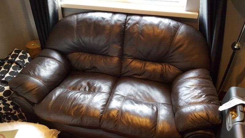 Two seater brown leather couch