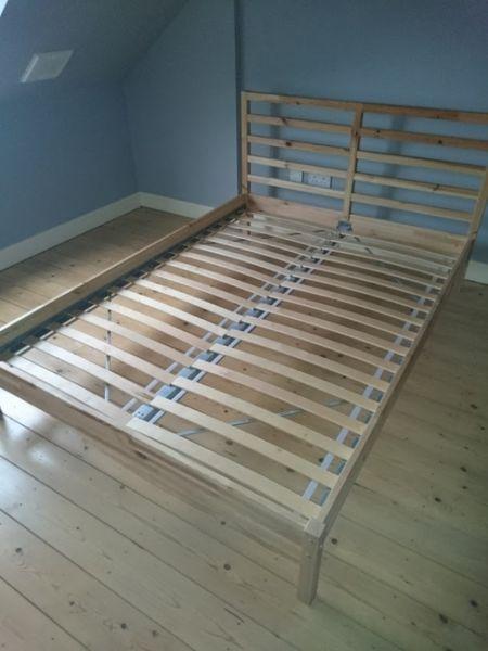Slatted double bed with solid wood frame in excellent condition