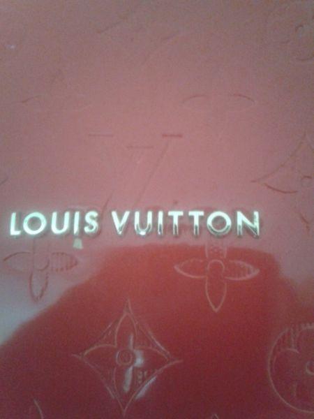 Louis vuitton bag red with gold excellent condition