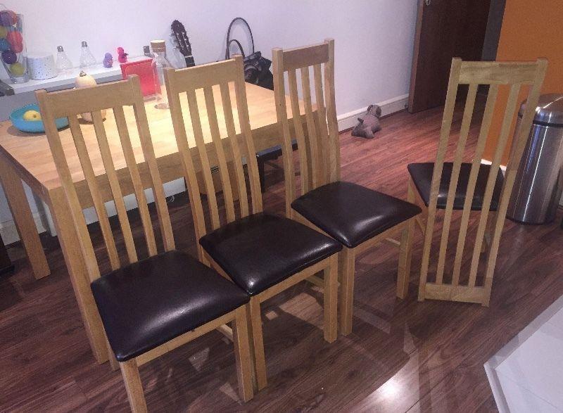 Solid oak dining chairs with leather seat x 4