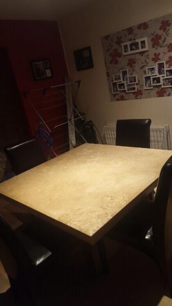 Marble dinning table with 4 brown leather chairs