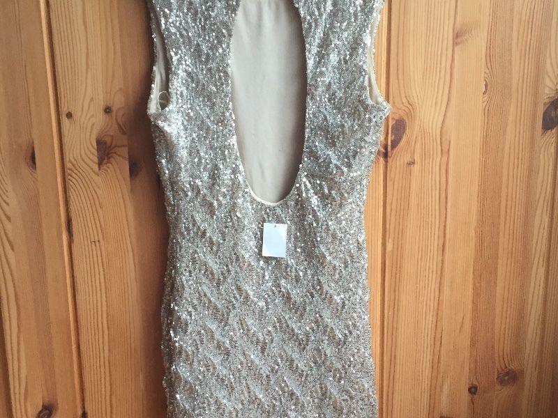 Ladies sparkly dress with tags