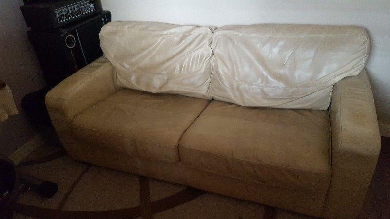 Cream leather bed settee. Good condition may suit small apartment