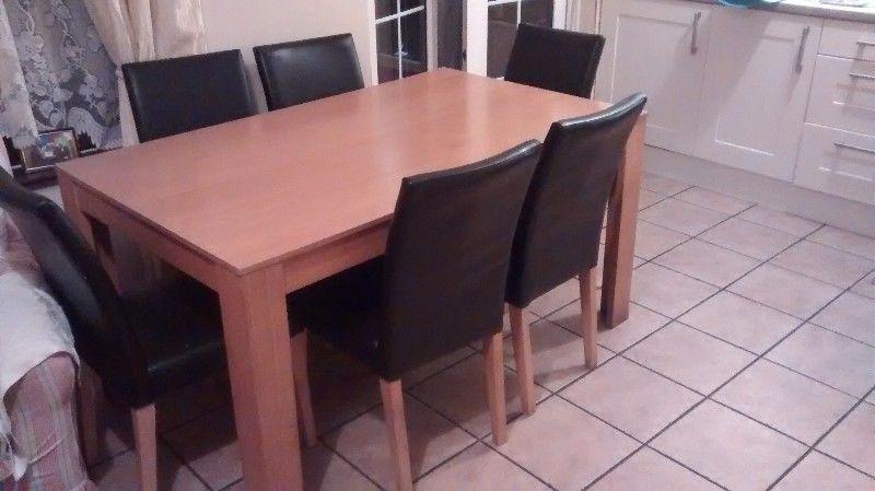 Dining Table and 6 chairs. 50 euro