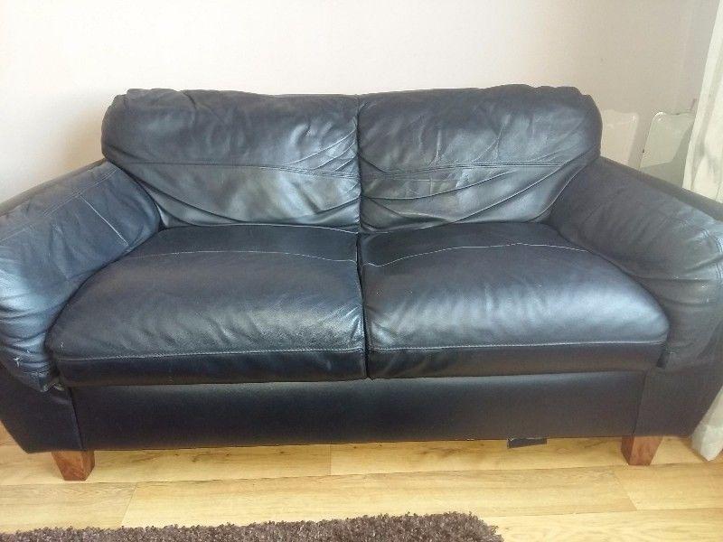 2 leather 2 seater sofas