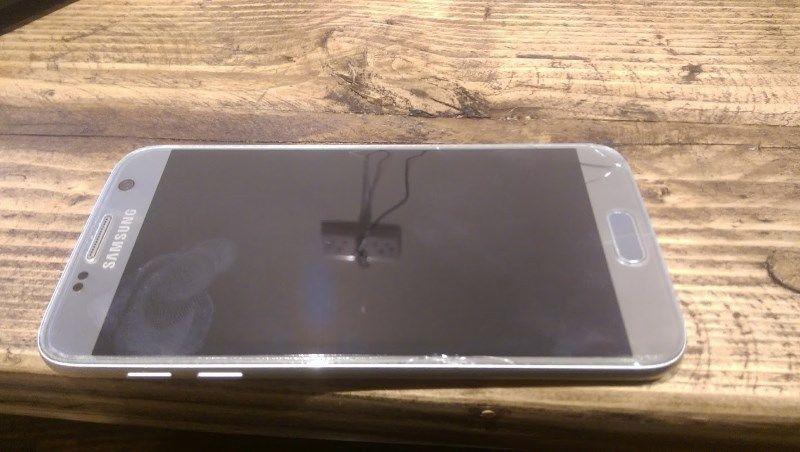 Samsumg Galaxy S7- less than 1 year (minor edge cracks)