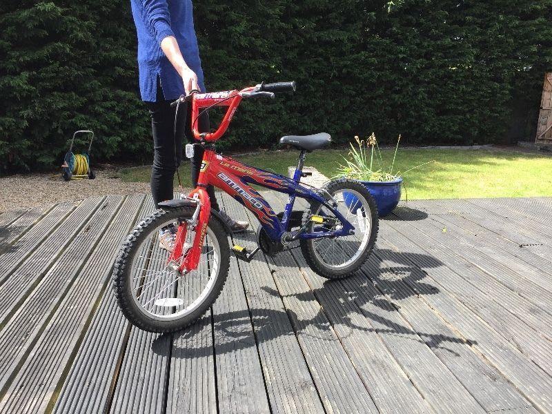 Kid's BMX Bicycle. 18 inch wheels. Cycle Helmet included
