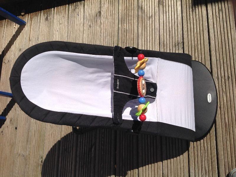 BabyBjörn Babysitter Balance Bouncer in excellent condition. Along with wooden 'googly eyed' toy