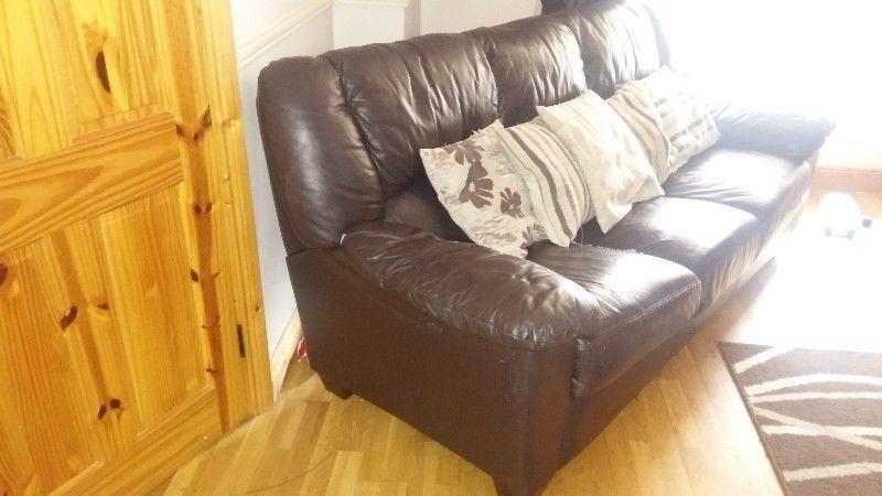 Free dark brown leather sofa