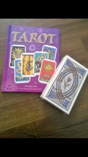 Tarot book and cards