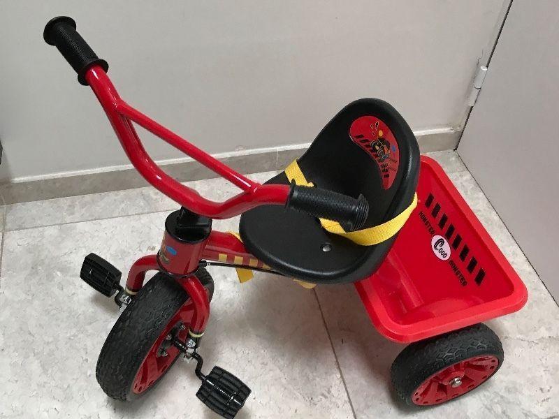 Red trike for toddlers