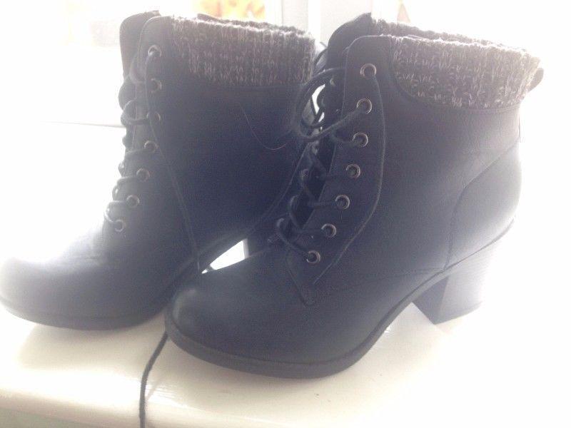 Black heeled lace boots