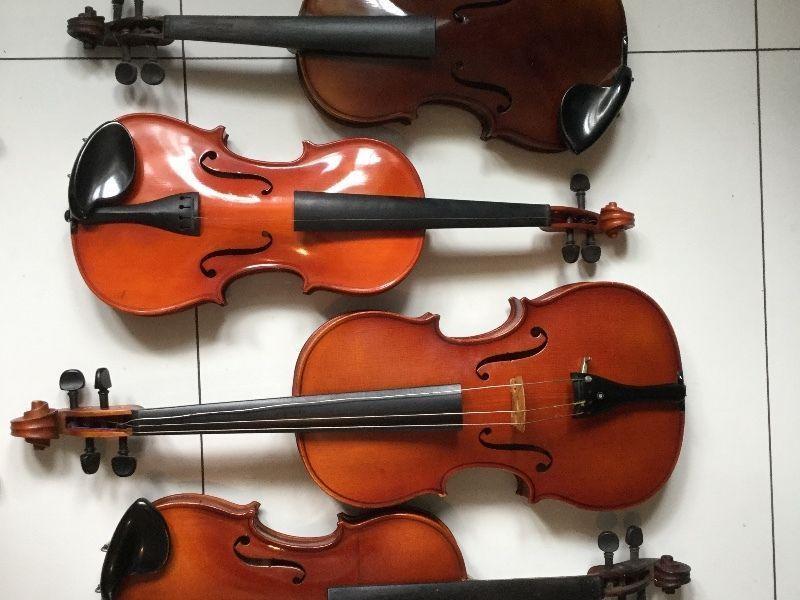 4 violins great condition