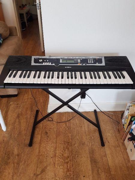 Yamaha keyboard with stand