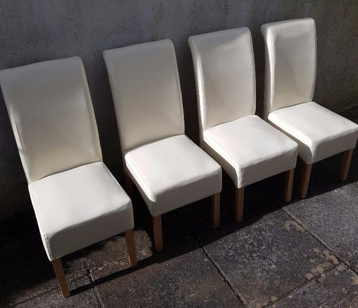 Four faux leather chairs available, excellent condition