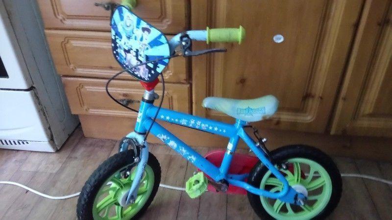 Children's bike and mini trampoline for sale