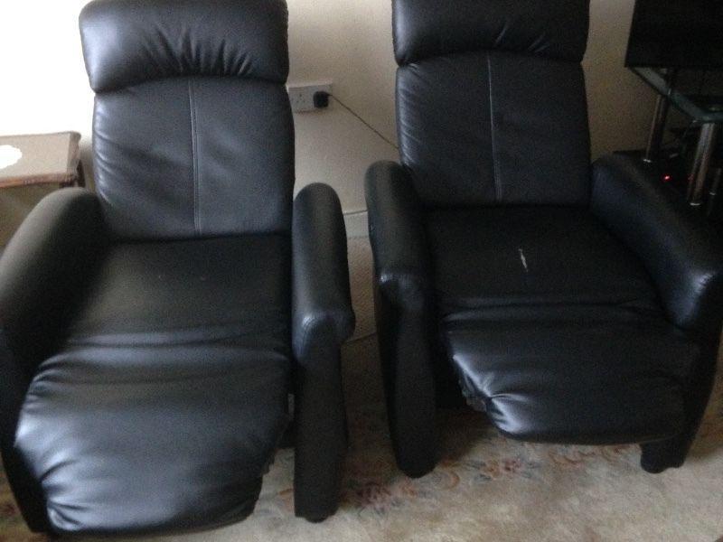 2 Black Recliners In Good Condition