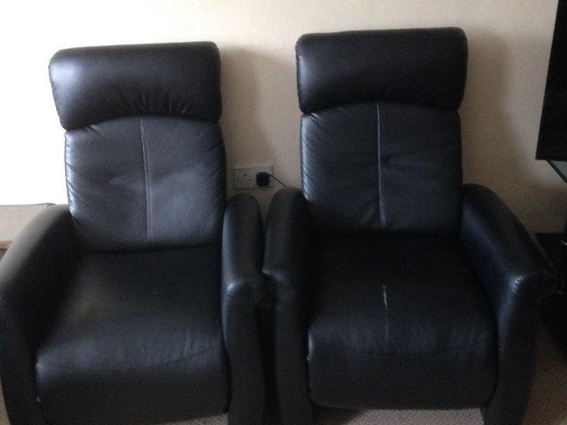 2 Black Recliners In Good Condition