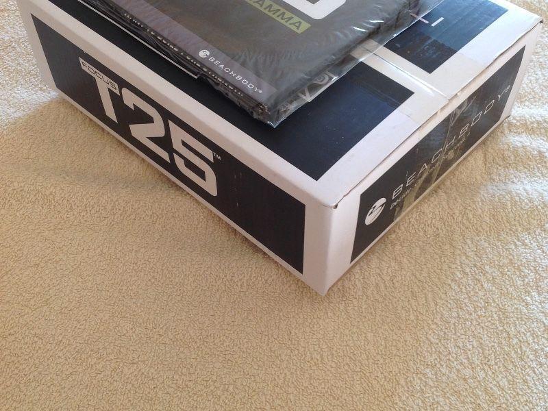 T25 total fitness DVD set. 14 discs. Guides inc