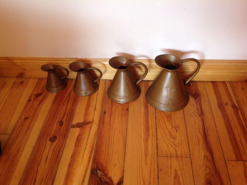 4 copper jugs