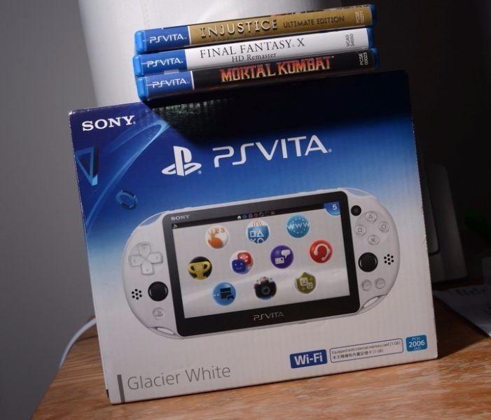 Sony Playstation Vita slim with games - good as brand new