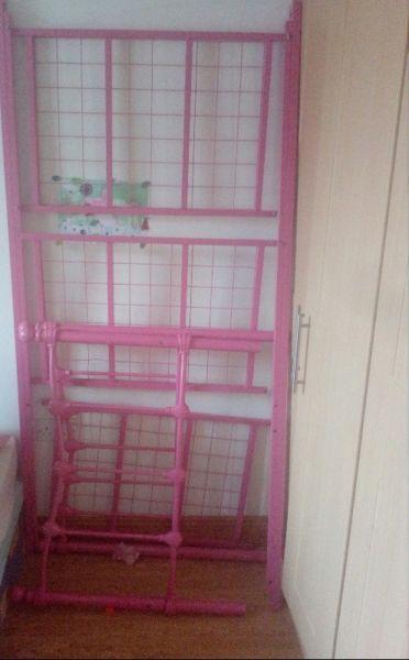 Girls pink bed with mattress and toddler bed