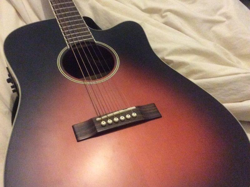 Solid wood cedar top guitar. Mint condition
